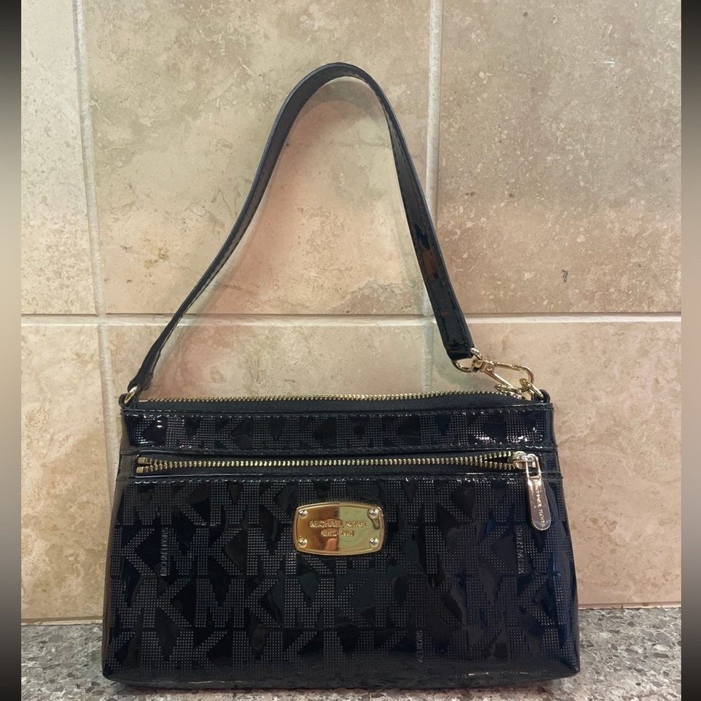 Michael Kors black patent wristlet with adjustable strap